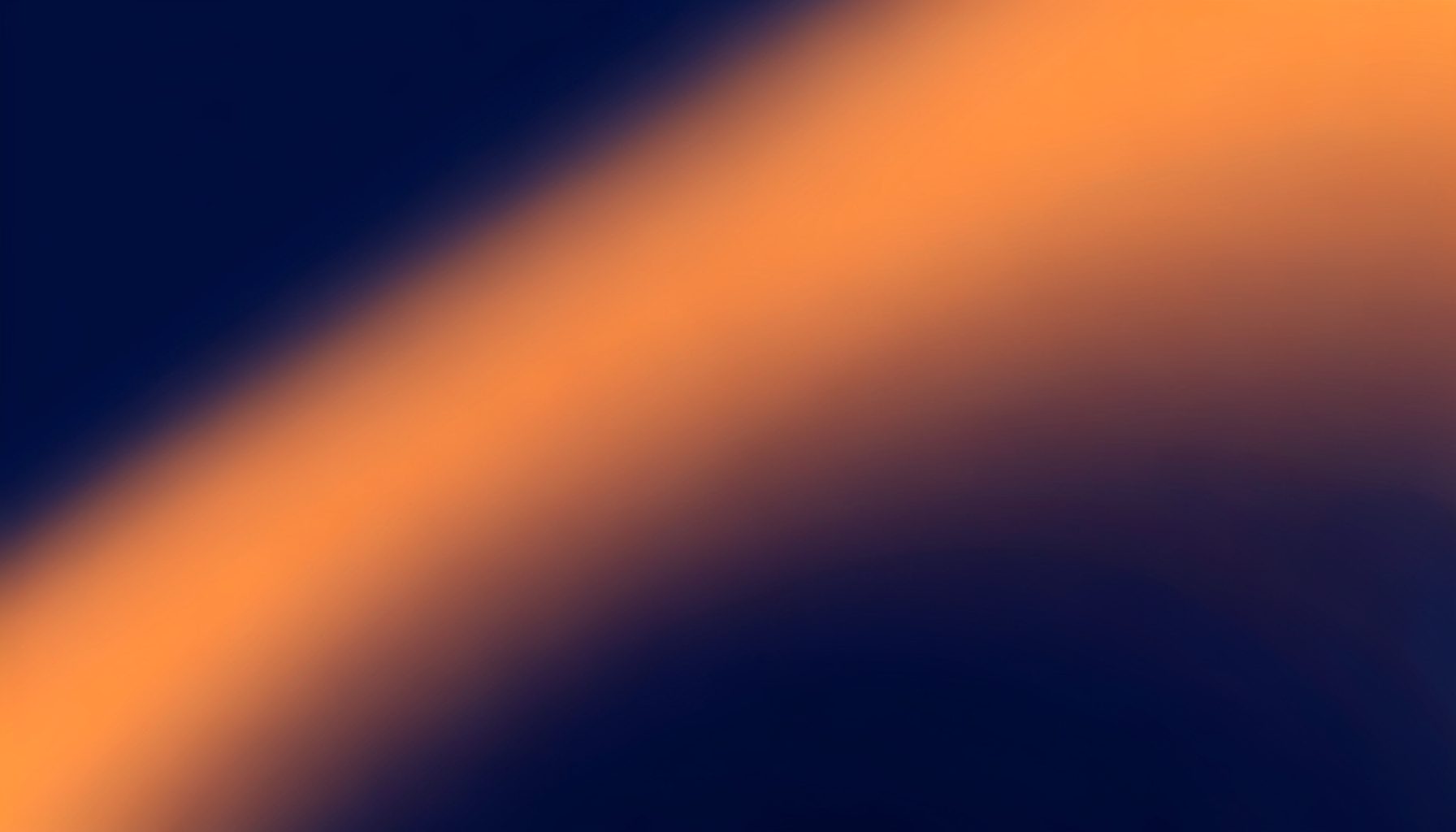 Full-width abstract gradient background in deep navy blue and warm amber orange tones with a smooth diagonal transition