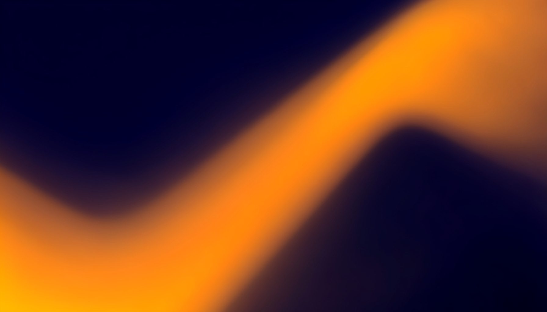 Abstract gradient composition in deep navy and warm amber tones suggesting electromagnetic wave patterns